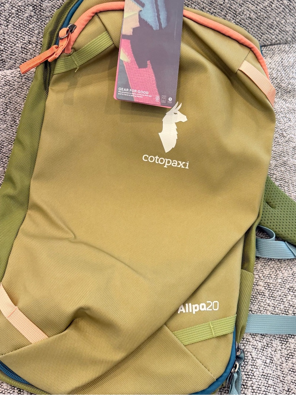 cotopaxi Allpa 20L backpack in olive green with orange trim